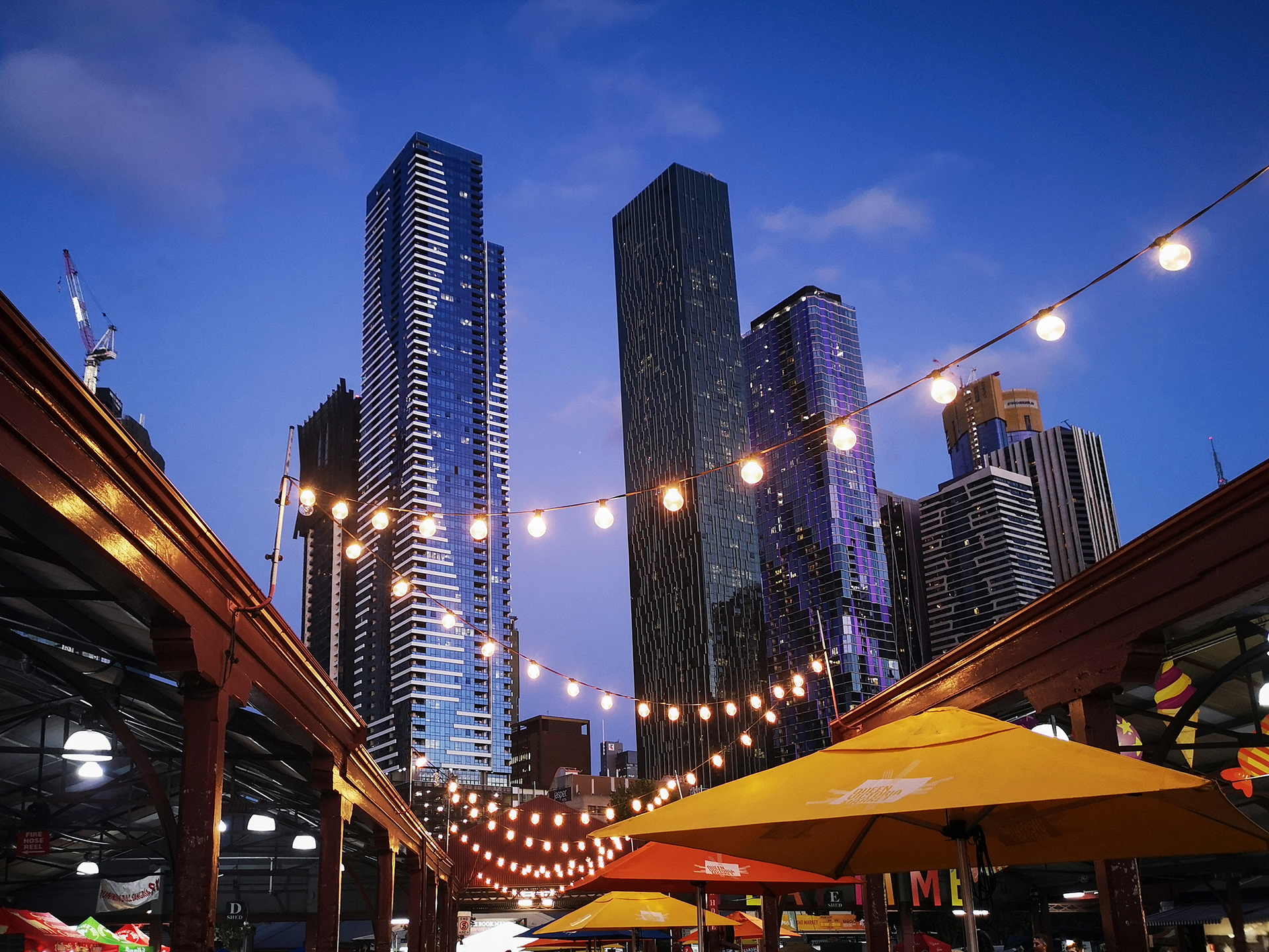 Melbourne high-rise buildings at dusk representing governance, building performance, and effective property management.
